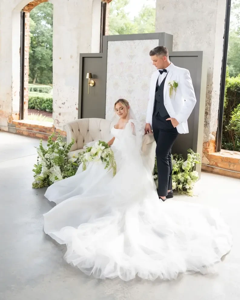 Photo of the model wearing a blue bridal gown