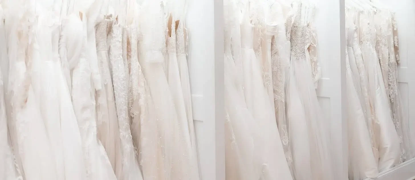 wedding dresses on rack