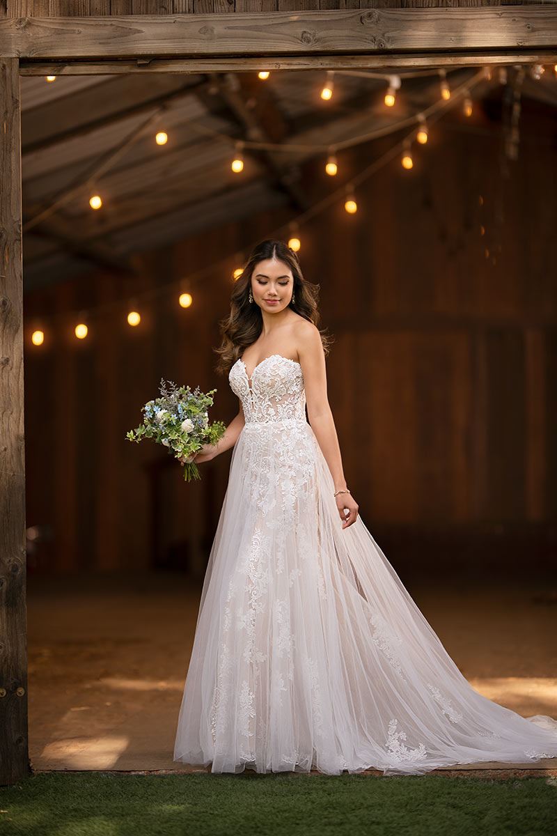 Model wearing a Essense gown