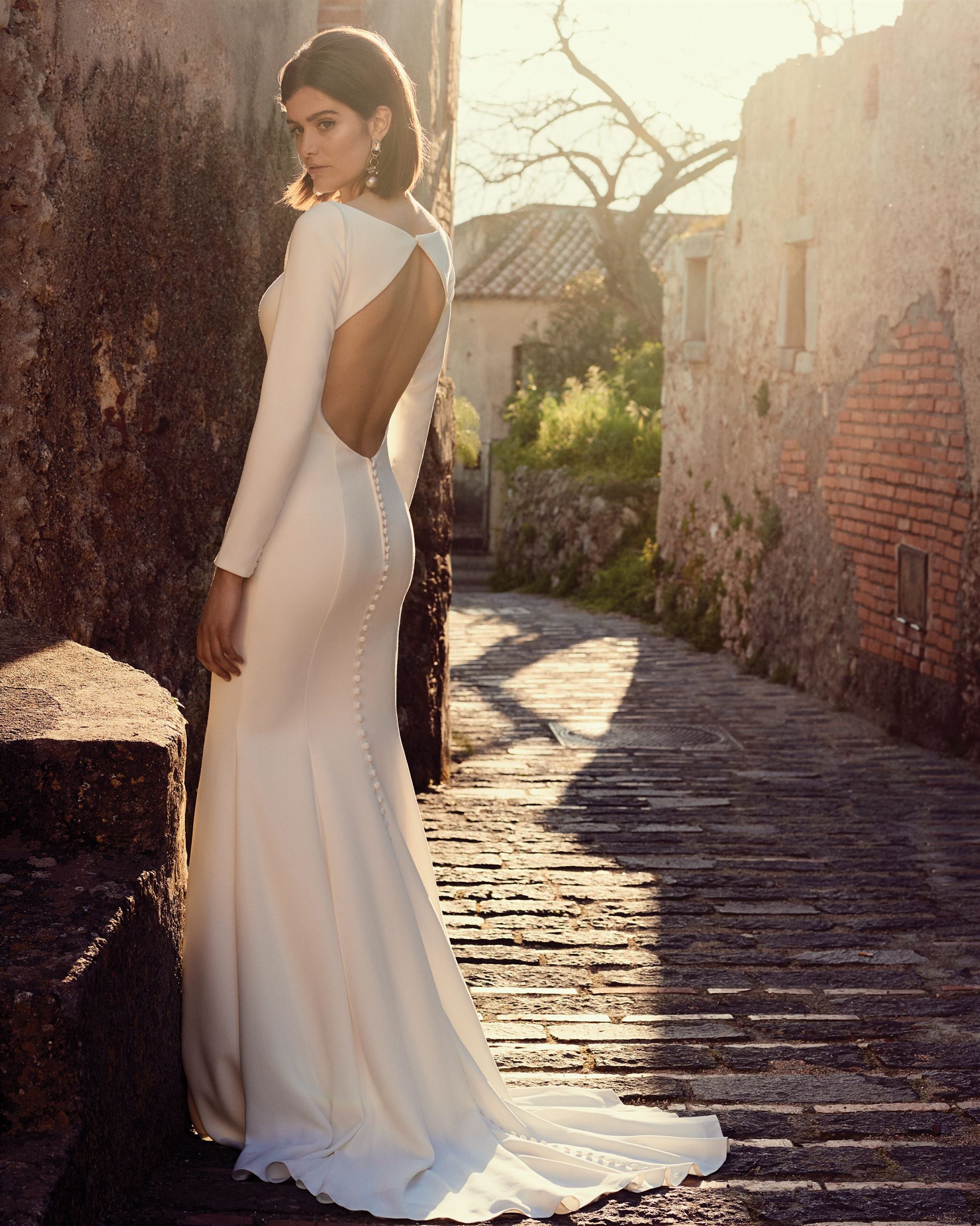 Model wearing a Justin Alexander gown