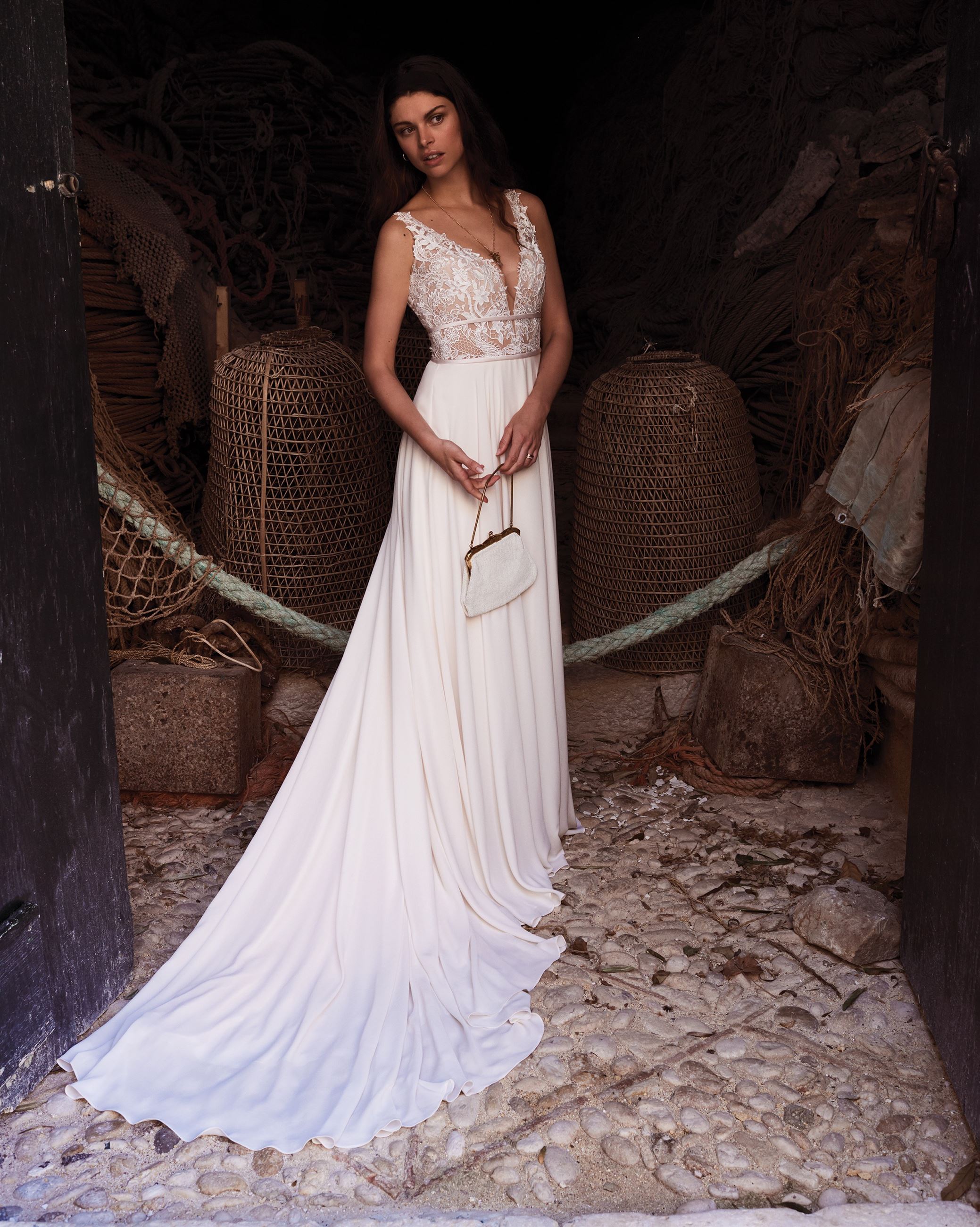 Model wearing a Lillian West gown